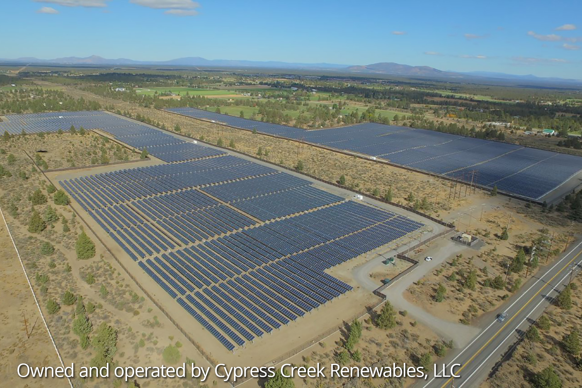 Field of solar panels at the Neff Solar installation site in Oregon.